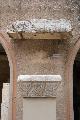 Marble capital decorated with Jewish menorahs. Above it a marble cornice bearing the inscription SYNA]GOGE OF THE HEBR[�WS