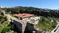The region of Islahane: next to the east walls, where the other three building used to stand. In the background lays the cemetary of Evangelistria.